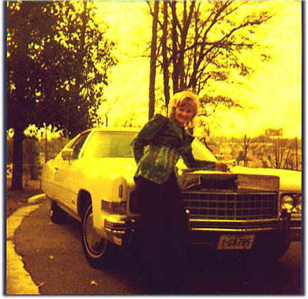 Jackie at Graceland in 1973, standing in front of Master Kang Rhee's 
Cadillac (a gift from Elvis.)