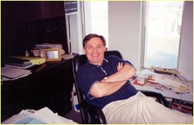 A real life Stanley Jones, survivor & co-author Mr Brian Clark 
of Newark NJ in his office in the South Tower circa 2000.